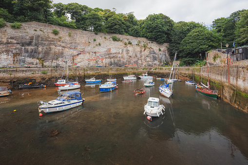 A collection of boats at Dysart Harbour, a popular filming location in Fife, Scotland.