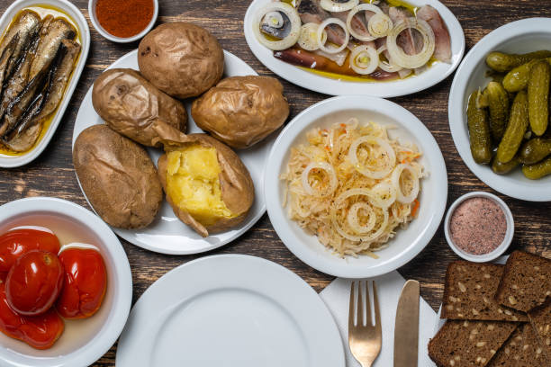 istock Simple rustic ukrainian food on wooden table, close up, top view. 1296894980