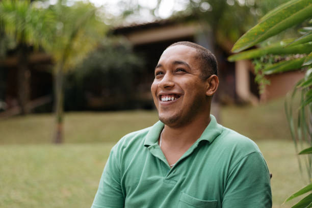 istock Smiling man at country house 1296896617