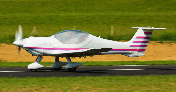 istock Sports airplane in motion over runway 1296897942