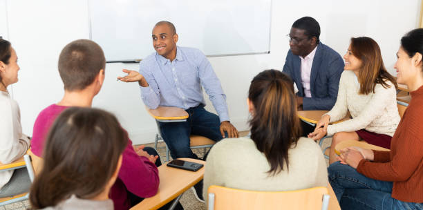 istock Teacher conducts refresher course for employees 1296899039