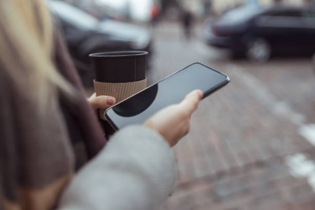 istock Young blond lady working in cafe and walking in city 1296899404
