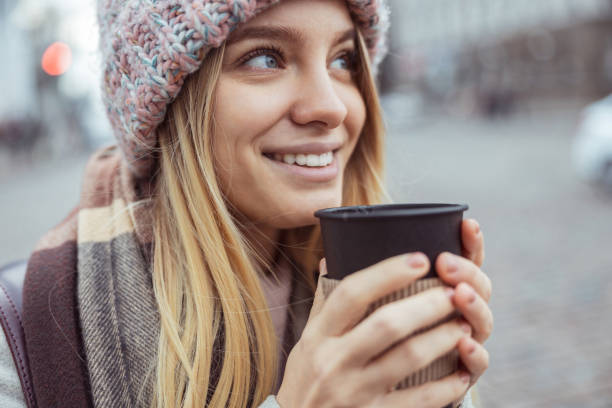 istock Young blond lady working in cafe and walking in city 1296899442
