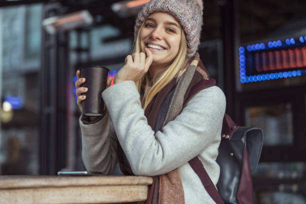 istock Young blond lady working in cafe and walking in city 1296899521
