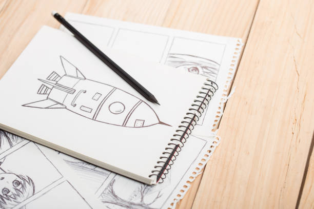istock Artist drawing an anime comic book in a studio. 1296905810