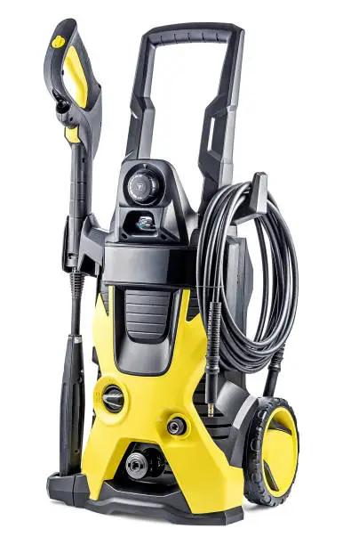 Pressure Washer Isolated on White Background. Professional High-Pressure Tool Car Cleaning Yellow-Black Color. Pressure Washer Machine. Electric Household Appliances. Side View Close-Up.
