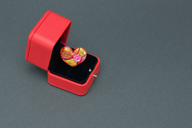 istock Pink heart in red box 1296911118