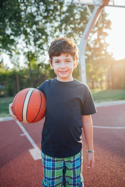 istock Cute Little Basketball Player 1296915664