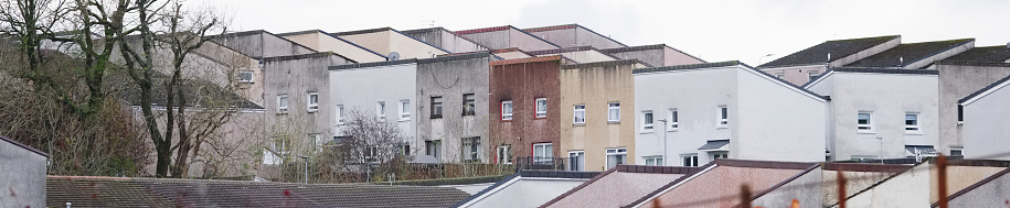 Derelict council house in poor housing estate slum with many social welfare issues in Port Glasgow uk
