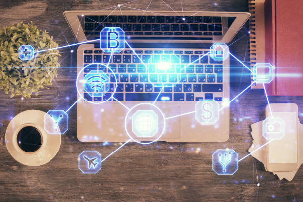 istock Social network hologram drawings over computer on the desktop background. Top view. Double exposure. 1296917171