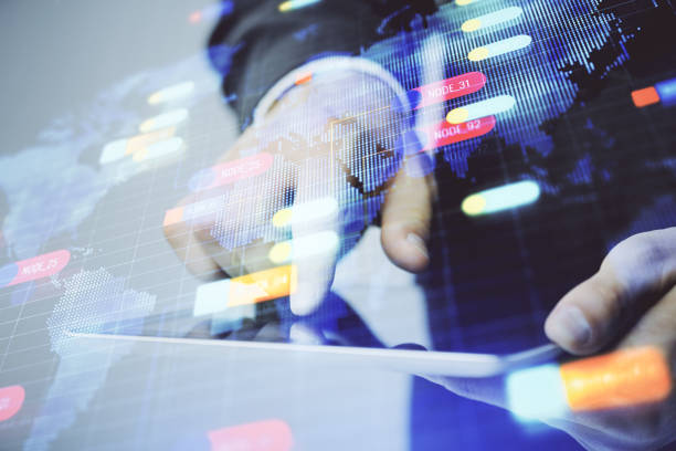 istock Multi exposure of man's hand holding and using a digital device and data theme drawing. Innovation concept. 1296917723