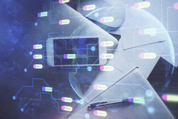 istock Double exposure of technology theme drawing over work table desktop. Top view. Global data analysis concept. 1296917955