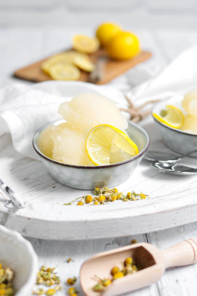 istock Homemade Lemon Sorbet scoops in shabby chic kitchen 1296918043