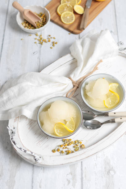 istock Homemade Lemon Sorbet scoops in shabby chic kitchen 1296918224