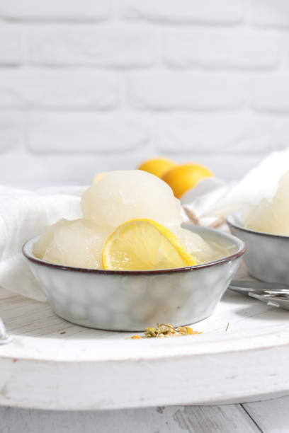 istock Homemade Lemon Sorbet scoops in shabby chic kitchen 1296918244