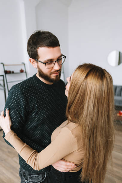istock Young couple lovers embraced each other, relationship concept. 1296922346