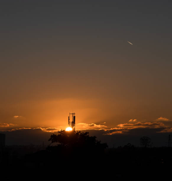 istock Beautiful sunset in background with telecommunications towers 1296924685