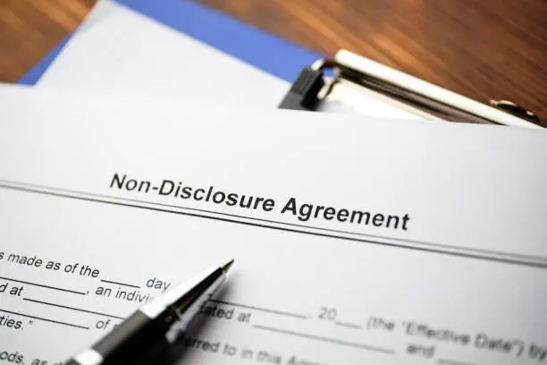 Legal document Non-Disclosure Agreement on paper close up