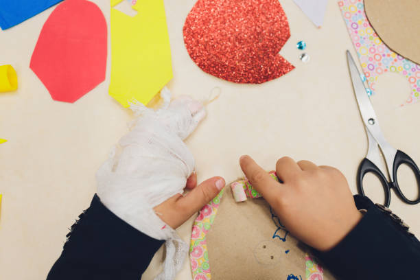 istock Master class to create a flower from paper.Children's creativity.Favorite hobby for children.Materials and tools. 1296932162