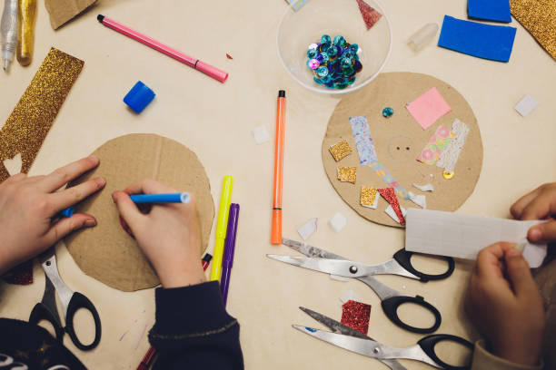 istock Master class to create a flower from paper.Children's creativity.Favorite hobby for children.Materials and tools. 1296932167
