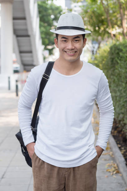 istock happy smiling man traveler portrait 1296932555