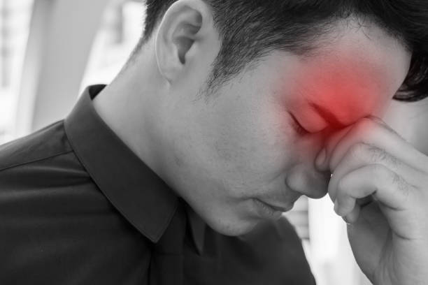 istock stressful sick businessman having headache, vertigo, migraine, emotional problem 1296932624