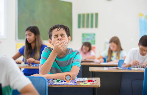 istock Yikes, I'm yawning in class! 1296933920