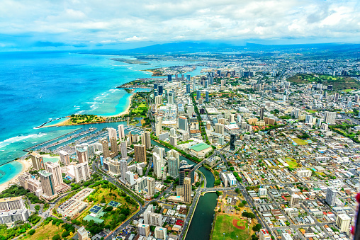 Wide angle aerial view of the beautiful city of Honolulu, Hawaii located on the island of Oahu shot from about 1000 feet in altitude.