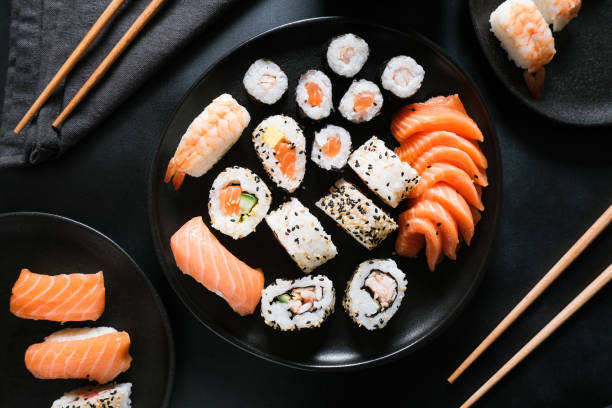 istock Sushi rolls hosomaki set with salmon and avocado 1296951697