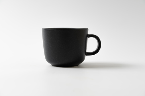 black color coffee mug on white background