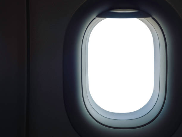 istock Airplane, aircraft window with white blank space. 1296953247