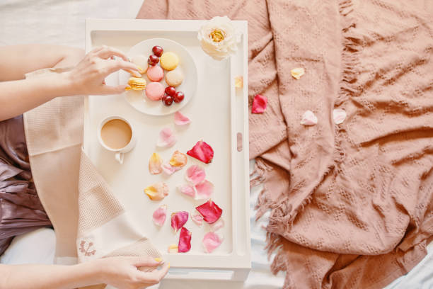 top view of romantic breakfast in bed. - flower cherry cup tea imagens e fotografias de stock