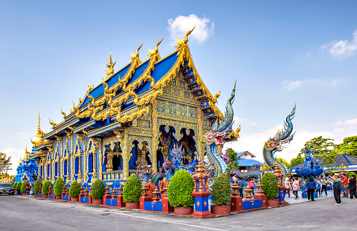Thailand - November 18, 2019 : Tourist enjoy sightseeing Blue Chapel  of Wat Rong Suea Ten Temple, one of most famous tourist destination in Chaing Rai Province, Northern of Thailand