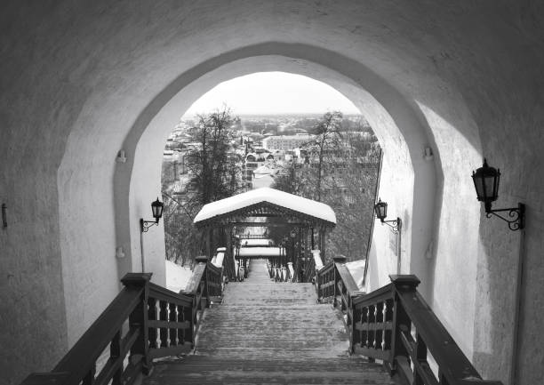 The stairs are raised under a stone arch. Old Russian architecture of the XVII century in the first capital of Siberia
