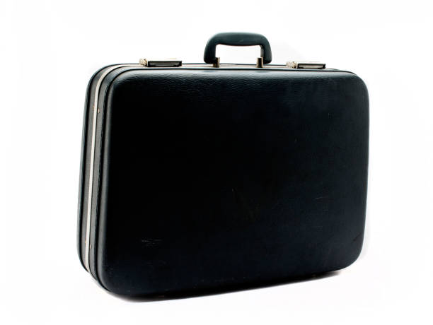 istock Old vintage suitcase on white background 1296960054