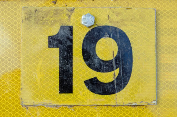 istock Number 19 on a road sign 1296960070