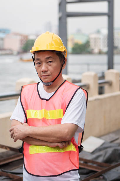 istock port labor, industrial logistics working staff standing at working site 1296962217