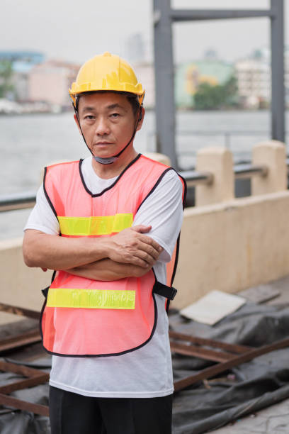 istock port labor, industrial logistics working staff standing at working site 1296962225