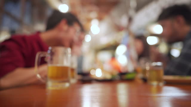 Defocused - Afterwork dining with beer