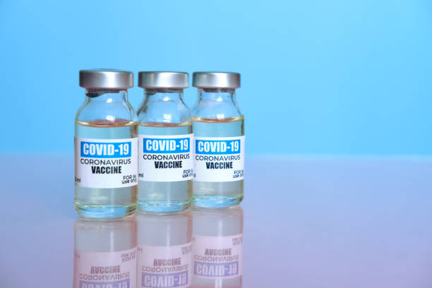 istock Ampoules with COVID-19 coronavirus vaccine, 1296965234