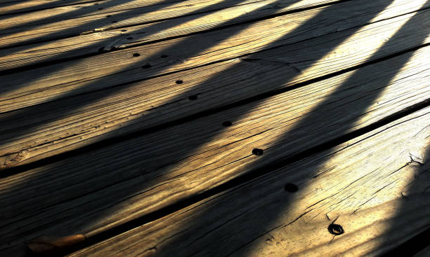 istock Outdoor wooden floor under sunset. 1296969989