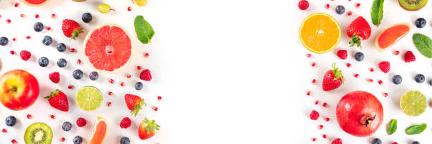 istock Fresh summer fruit panorama, a flat lay on a white background 1296971319