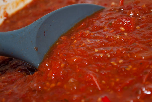 istock Close Up Cooking Spaghetti Sauce 1296973123