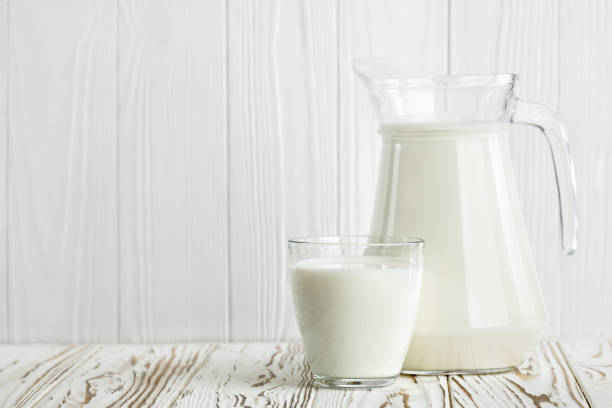 istock milk in glass and jug 1296973306