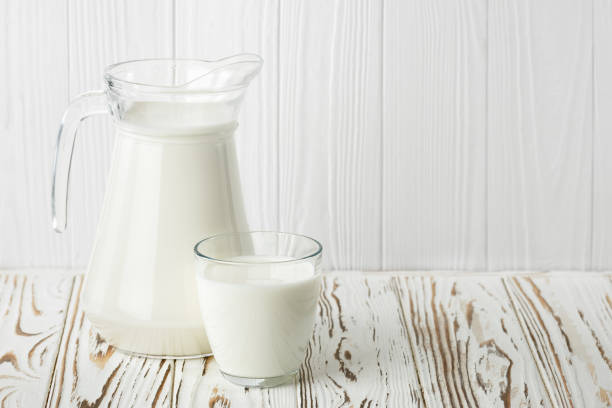 istock milk in glass and jug 1296973326