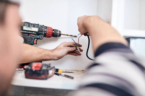 istock Handyman worker assembling furniture and fixing it. 1296974066