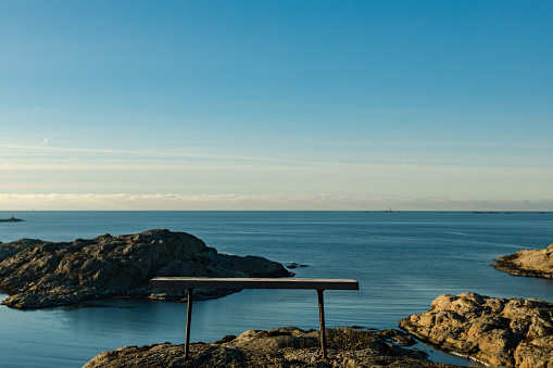 A bench on an island in the archipelago in Gothenburg, Sweden.