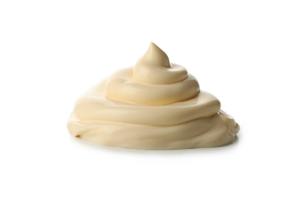 istock Mayonnaise sauce swirl isolated on white background 1296980203