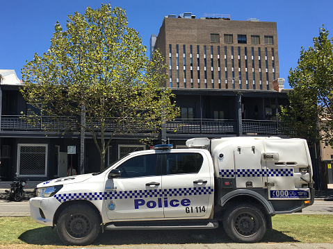 Perth, Wa - Jan 17 2021:Western Australia Police Toyota HiLux police paddy wagon with cage.Police vans are usually employed for prisoners transport or for the rapid transport of a number of officers.