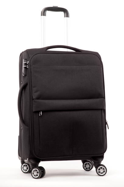 istock Travel black suitcase isolated on white background 1296980384
